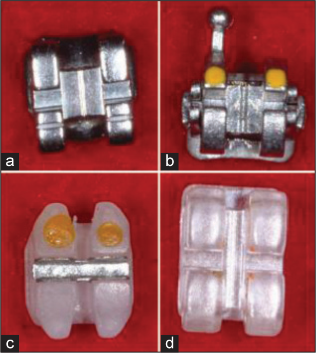 Brackets tested in the study. (a) Gemini True-twin Stainless Steel (3M Unitek, St. Paul, Minnesota) (b) SmartClip True-twin Self-ligating Stainless Steel (3M Unitek, St Paul, Minnesota) (c) Clarity True-twin Polycrystalline metal-reinforced Ceramic (3M Unitek, St Paul, Minnesota) (d) Inspire ICE True-twin Monocrystalline Ceramic (Ormco, Orange, California)