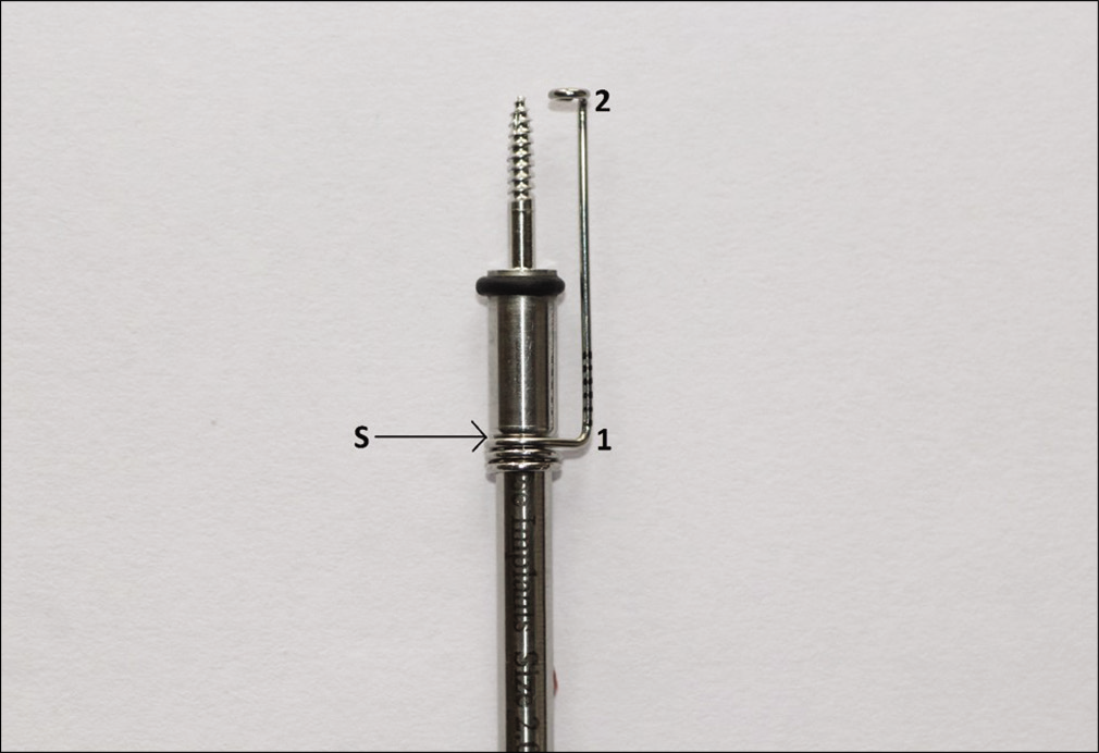Indicator device made with 0.7 mm SS wire on the implant driver attachment.